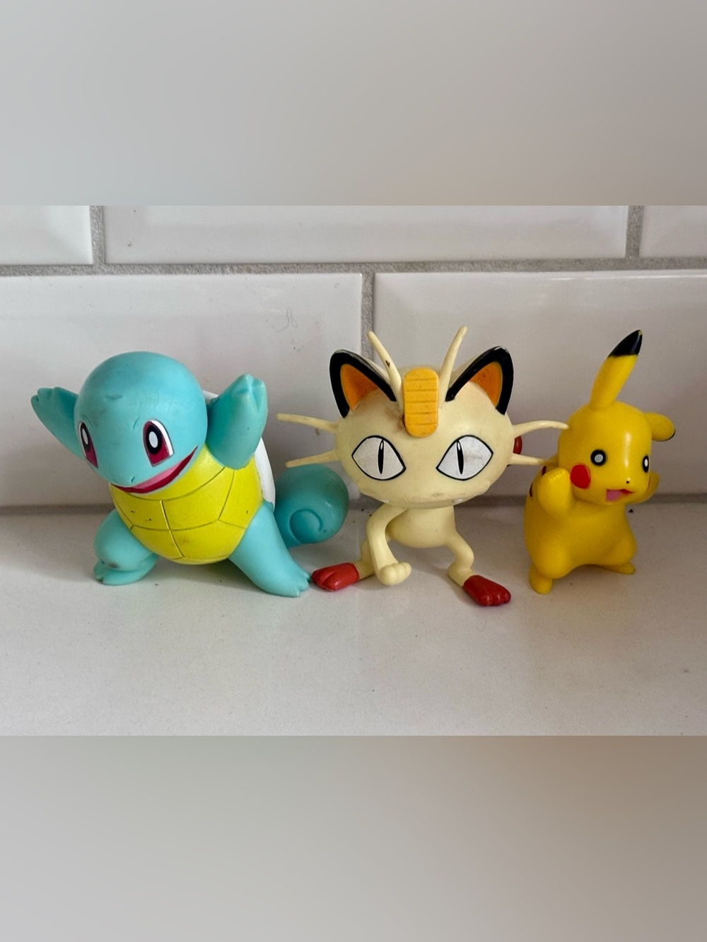 Pokémon figurines featuring Squirtle, Meowth, and Pikachu 2007 Jakks